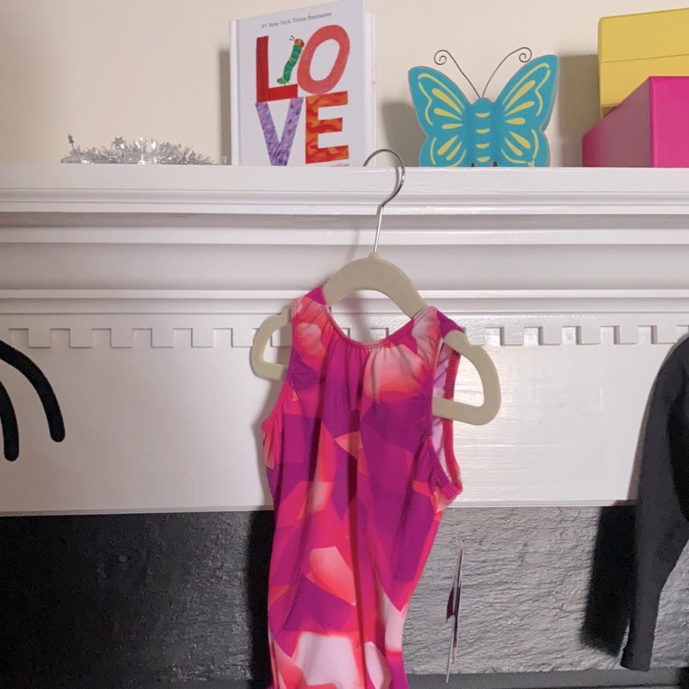 Youth Motionwear brand leotard. Size 8-10 for dance or theater. Pink and purple.